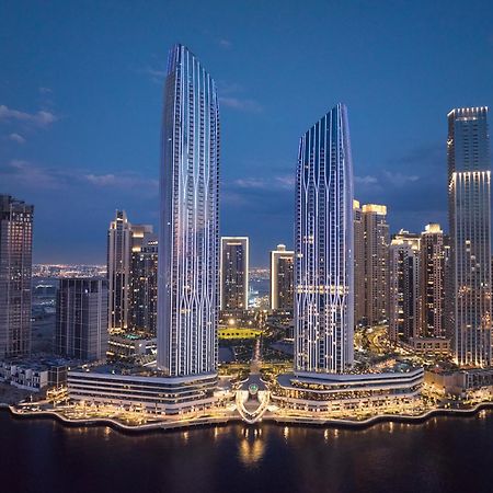 Hotel Address Creek Harbour Dubai Exterior foto The complex at night