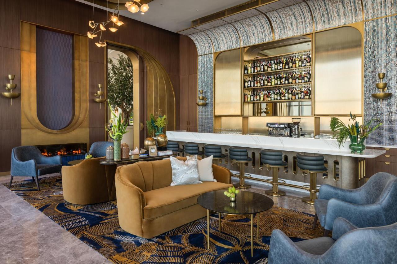 Hotel Address Creek Harbour Dubai Exterior foto The Bar at The St. Regis