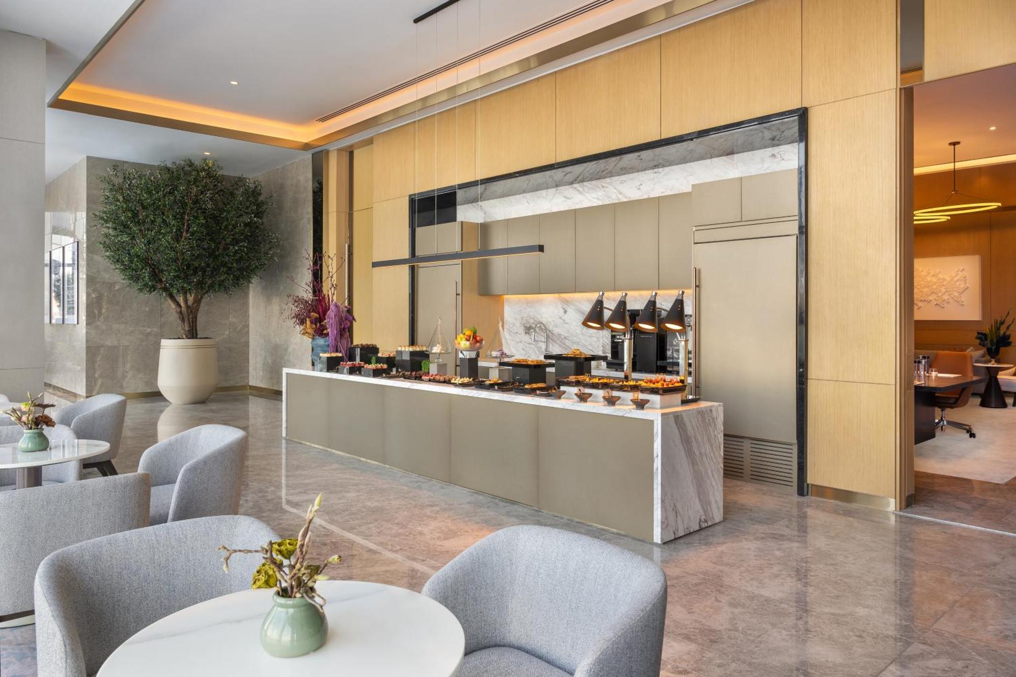 Hotel Address Creek Harbour Dubai Exterior foto The lounge at the airport