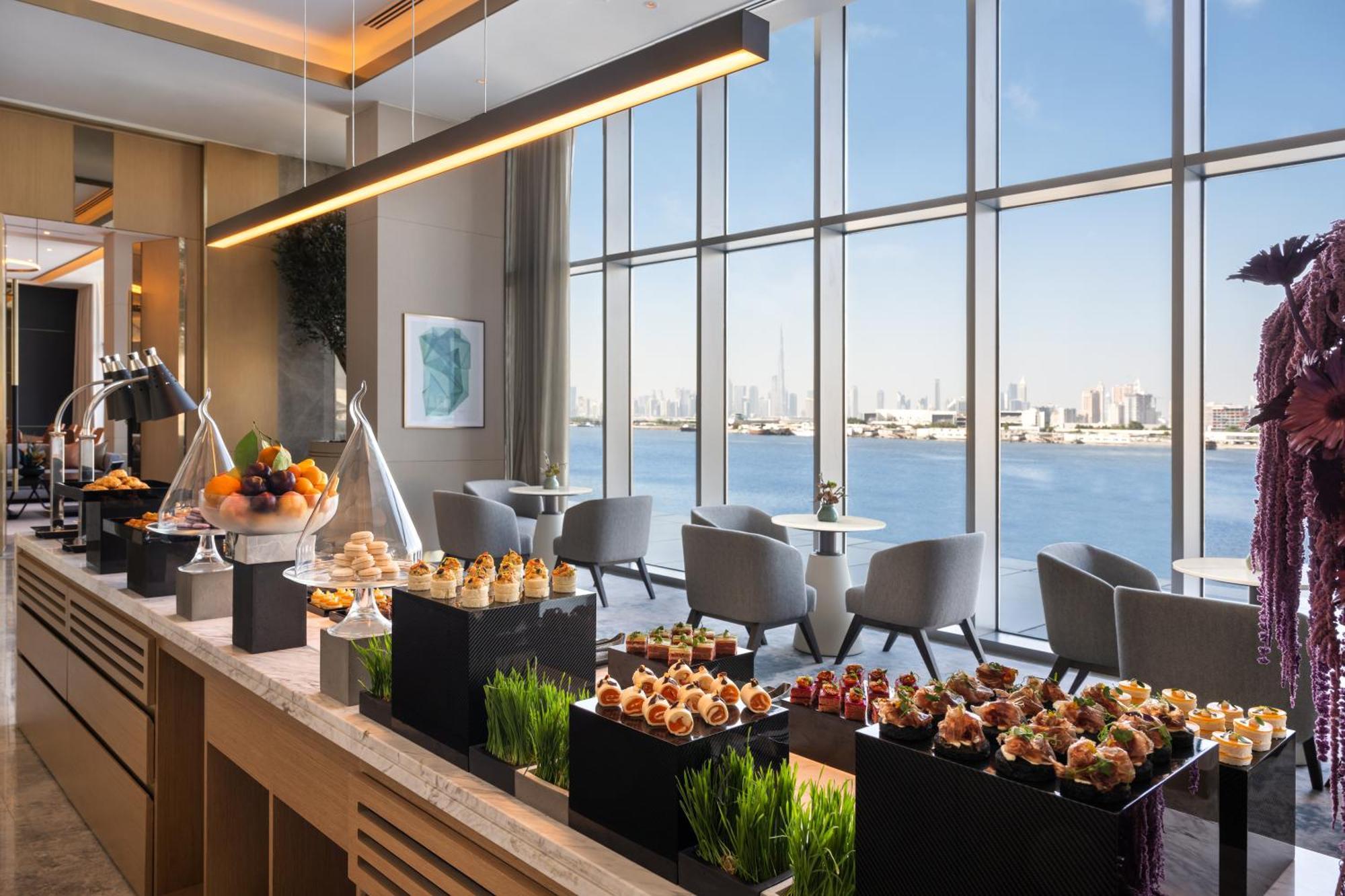 Hotel Address Creek Harbour Dubai Exterior foto The Lounge at the Jumeirah At Etihad Towers